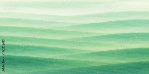 A beautiful summer landscape where a green field meets the horizon under a blue sky filled with white clouds and natural light