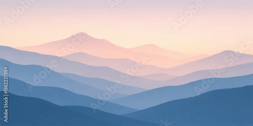 Misty blue mountain range at dawn with a forest valley under a foggy sunrise sky and peaks silhouetted against the morning horizon