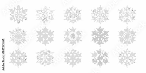 An assortment of delicate detailed snowflake illustrations in grayscale tones