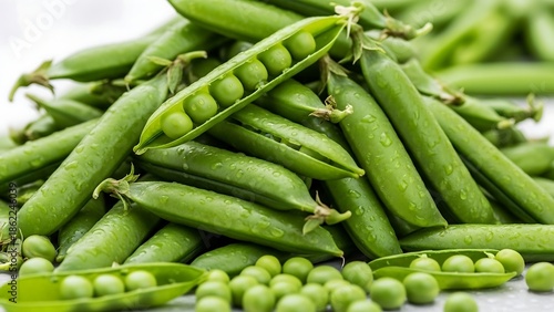 Fresh green peas and pea pods.