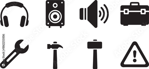 Black icons of construction tools warning signs and audio equipment on white background