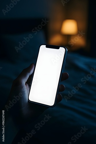 Person Holding Glowing Smartphone in Dark Bedroom at Night – Mobile Device Screen Light, Digital Connection, Bedtime Technology Use & Social Media Addiction Concept