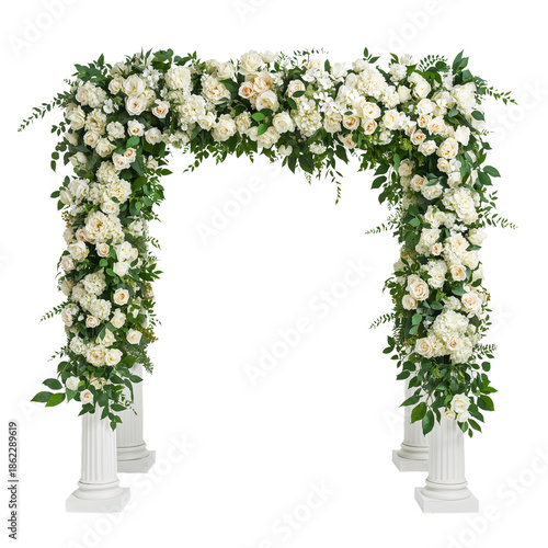 White Floral Arch Decoration at a Wedding Venue With Flowers Arranged on Gree...