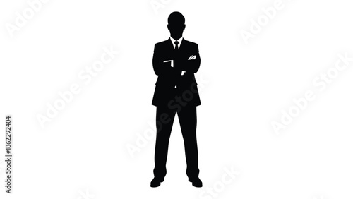 A striking silhouette of a man in a formal business suit stands confidently with arms crossed conveying power and authority