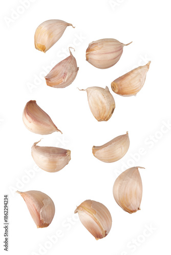 Garlic fell in a pile isolated on white background