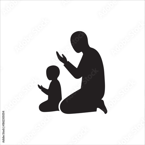 Silhouettes of adult and child in prayer together