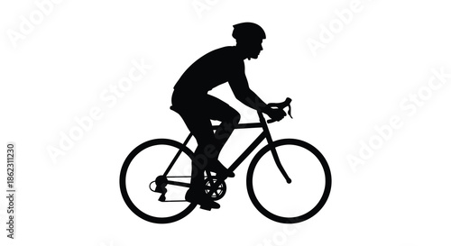 A striking silhouette of a cyclist riding a road bike conveying speed and athleticism
