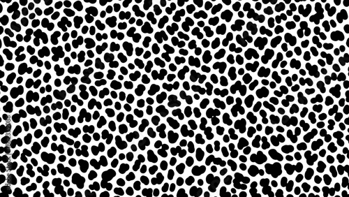 Abstract black and white pattern resembling a spotted animal hide, densely packed.