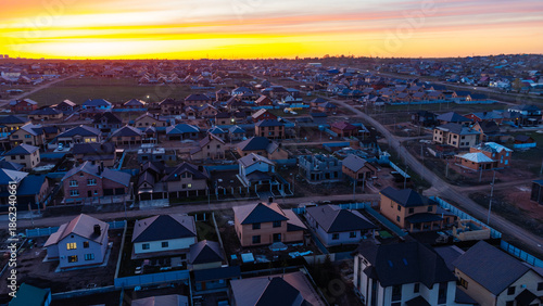 Foto Aerial view of the suburbs at sunset