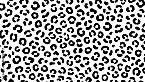 A repeating black and white pattern resembling leopard spots, covering the entire surface.