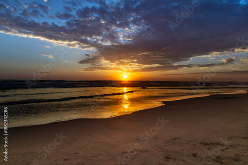 Sun setting over the Pacific Ocean from Mission Beach in San Diego, California, USA taken on June 1, 2025