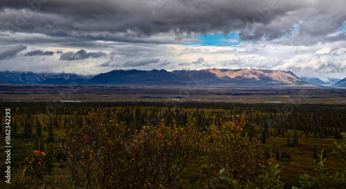 Sun shining on mountains on the Denali Highway