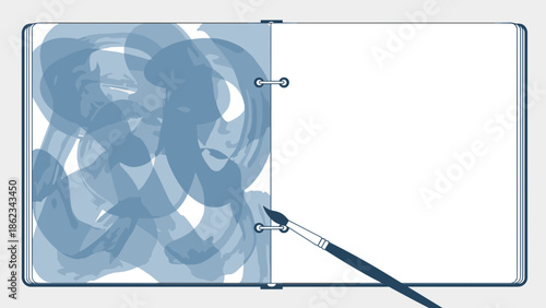 Open sketchbook with blue watercolor painting and paintbrush.