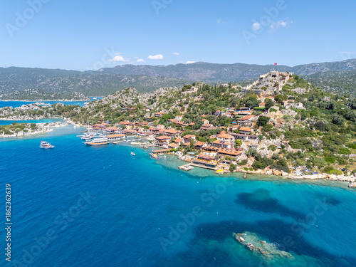 Wallpaper Mural Aerial view of Kaleköy (Simena), a historic coastal village with its ancient Simena Castle overlooking the bay in Antalya, Turkey. Torontodigital.ca