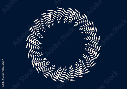 Elegant circular arrangement of fern leaves on dark background