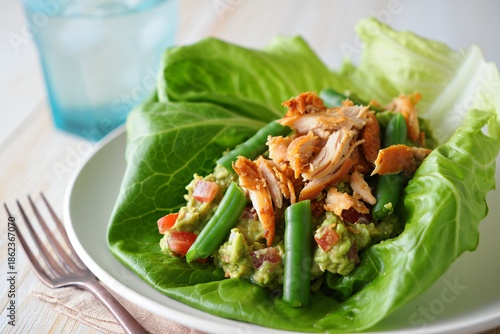 Fresh Green Salad with Chicken and Vegetables on Plate