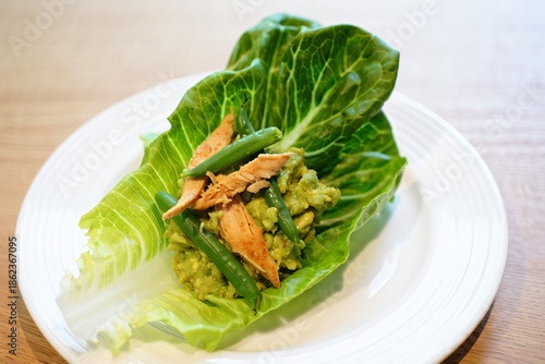 Fresh Green Lettuce Wrap with Salmon and Vegetables