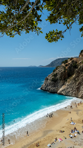 Aerial view of Kaputaş Beach, a famous beach with its turquoise water meets a small sandy-pebble beach between Kaş and Kalkan, Antalya, Turkey.