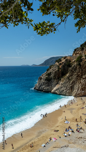 Aerial view of Kaputaş Beach, a famous beach with its turquoise water meets a small sandy-pebble beach between Kaş and Kalkan, Antalya, Turkey.