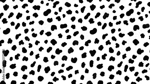 A white background is covered with a pattern of irregularly shaped black spots, creating a spotted texture.