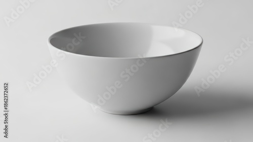 Elegant white ceramic bowl on plain background for culinary presentation