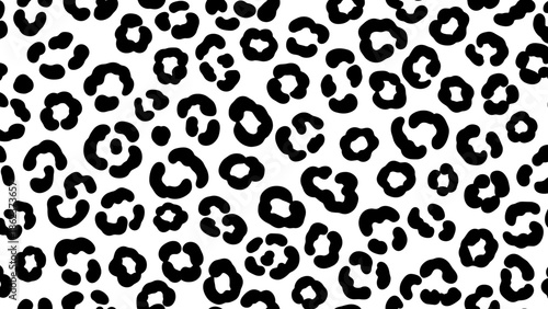 Black and white image depicting a leopard print pattern, with distinct spots.