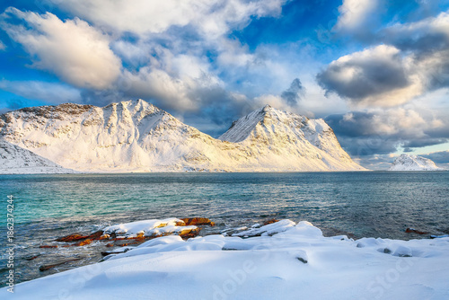 Wallpaper Mural Unbelivable winter view of Vik and Haukland beaches during sunset with lots of snow  and snowy  mountain peaks near Leknes Torontodigital.ca