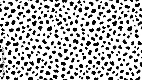 A dense pattern of irregular black spots scattered across a white background, resembling animal print.