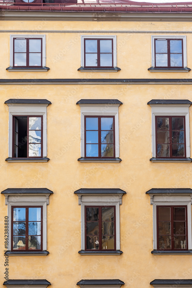 Obraz premium Colorful facades of tenement houses at the square Stortoget in the Old Town, Sweden, Stockholm