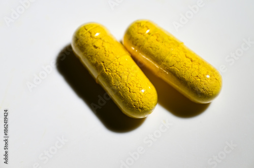 Close up of Berberine Supplement Capsule on White Background
