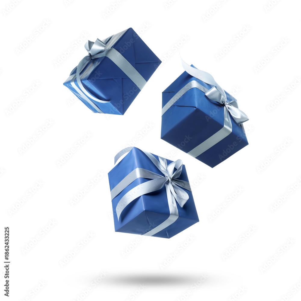 Fototapeta premium Gift boxes flying in air on white background