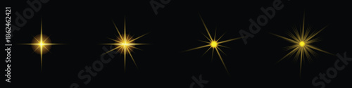 Golden Yellow Starburst Light Effects Set on Black Background