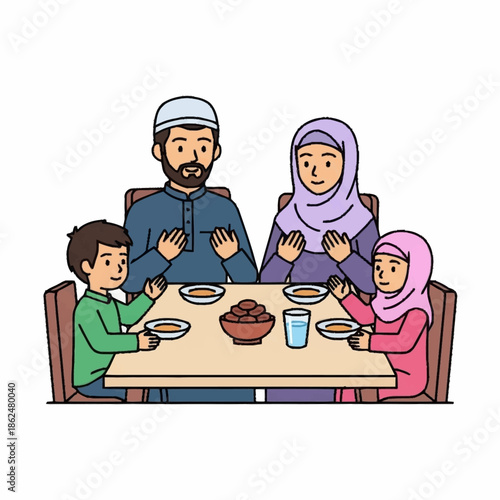 Muslim family praying before Iftar meal during Ramadan.