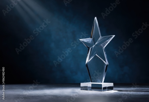 Clear star-shaped award on dark background (2)