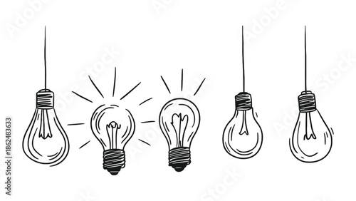 Several light bulbs are hanging from wires, with two illuminated.