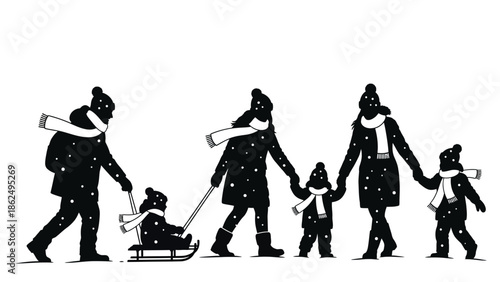 Family enjoying winter walk together in snow