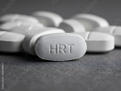 Macro view of hormone replacement pills showing women’s HRT medication for menopause wellness, Women's Menopausal Hormone Therapy & Wellness