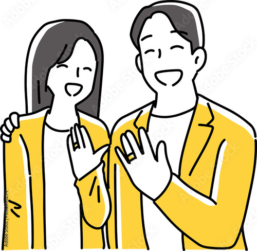 婚約指輪を見せる男女