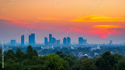 Wallpaper Mural Breathtaking sunset view over city skyscrapers, blending urban life with nature's vibrant colors at dusk Torontodigital.ca