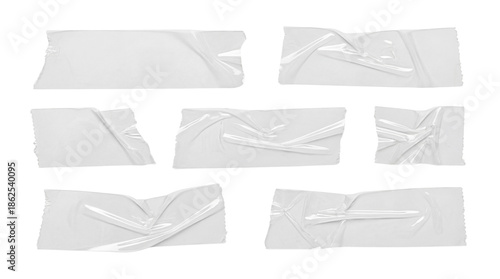 Set of crumpled and torn white adhesive tape pieces isolated on white background