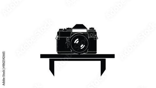 Classic film camera rests on a simple shelf, evoking nostalgia and the art of photography.