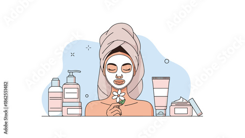Woman with a towel on her head and a cosmetic face mask on, surrounded by various skincare products for a beauty routine.