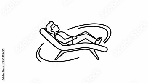 Man relaxing on a lounge chair enjoying a peaceful moment.