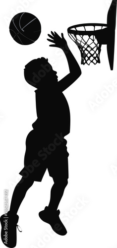 Silhouette Of A Boy Shooting A Basketball Hoop