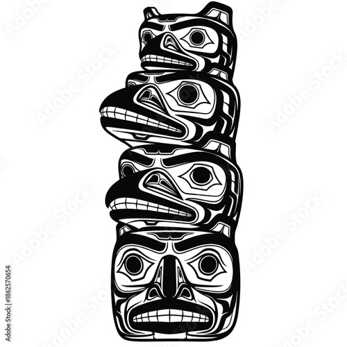 Totem pole with carved animal faces.