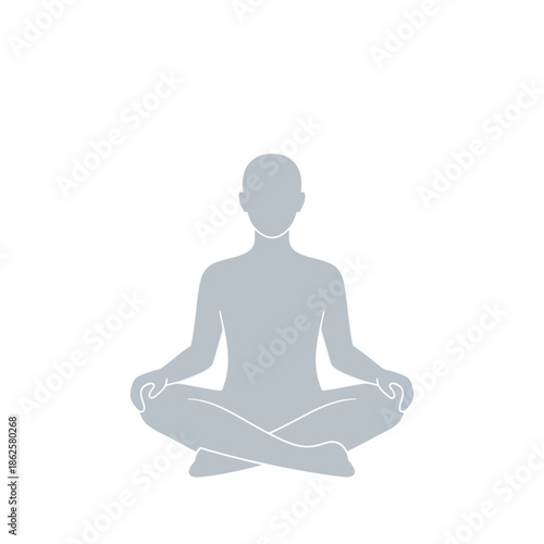 Silhouette of a person meditating in a lotus position.