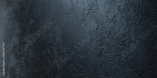 A textured dark gray wall background with a slightly rough uneven surface and subtle tonal variations