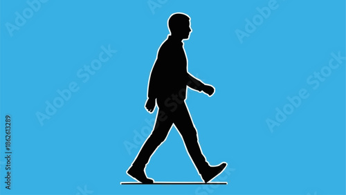 Silhouette of a man walking against a blue background.