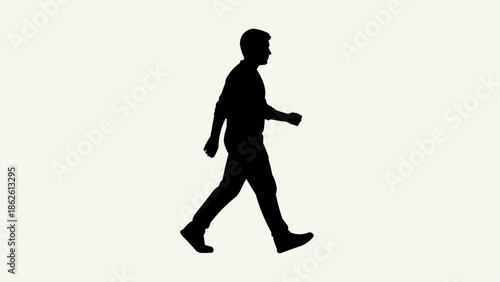 Silhouette of a man walking against a plain background.