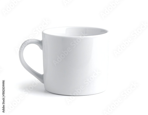 Plain white ceramic mug with handle, against a white backdrop